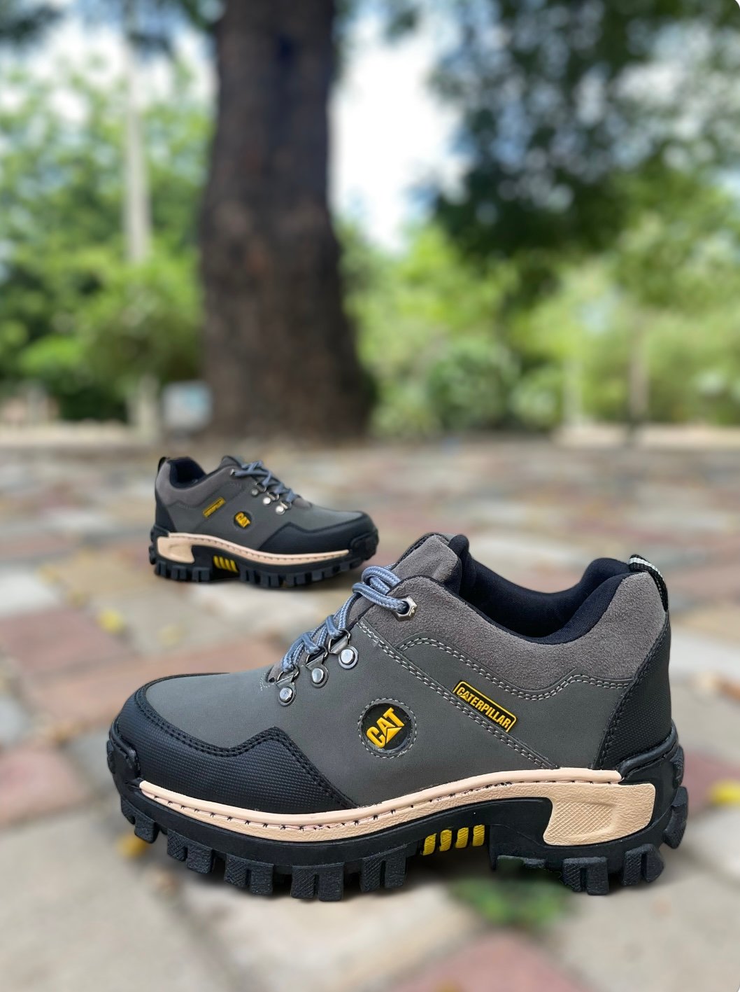 CATERPILLAR CORTE MEDIANO AAA GRIS